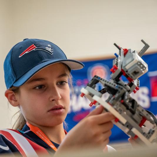 A CTY student building a Lego robot